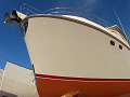 Demontáž stávající folie z boků a nástavby + aplikace ochranné transparentní folie s perletí na námořní loď Nordhafen 68 o délce 21 m přímo na ostrově Murter v Chorvatsku